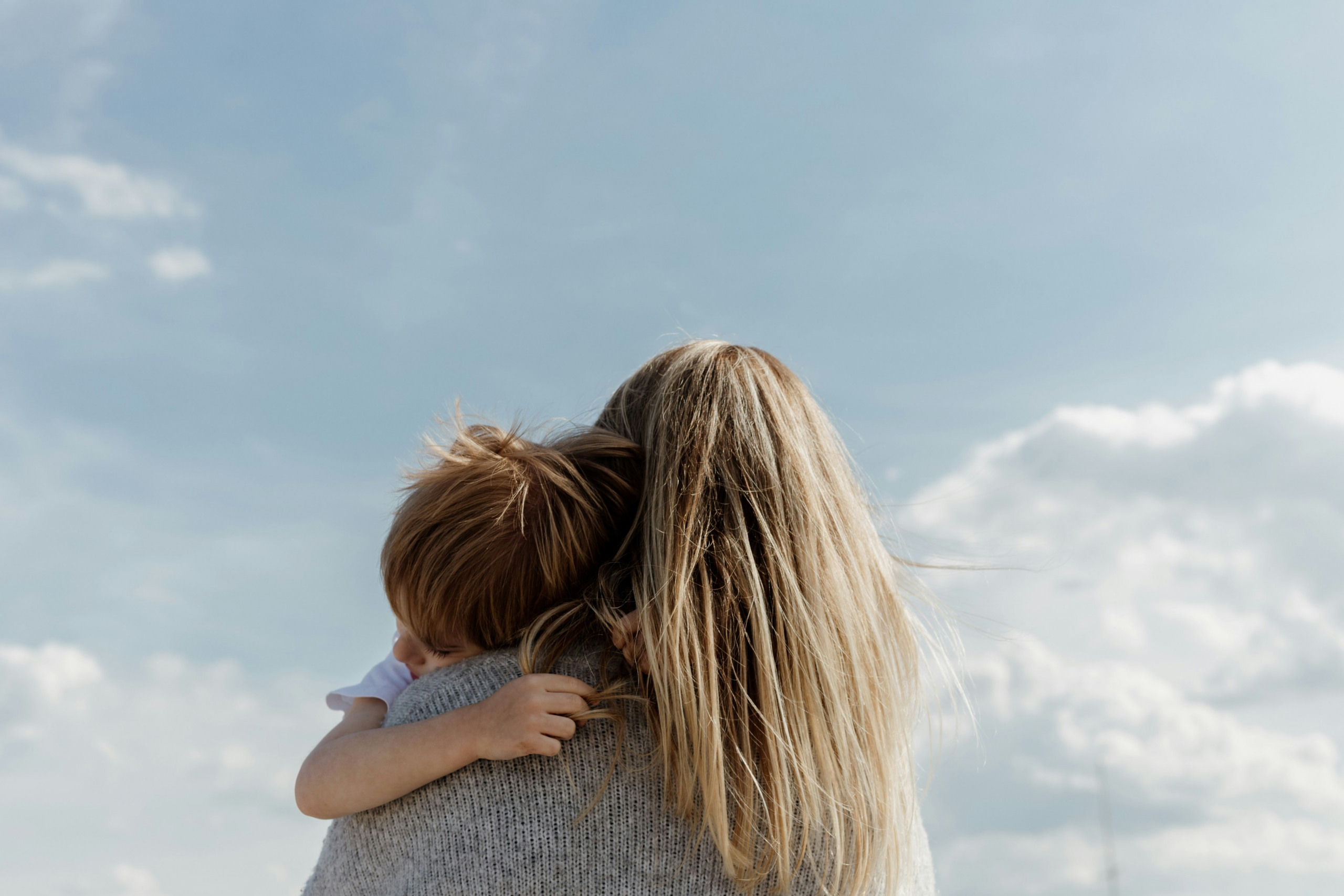 A woman holding a child representing child custody in South Carolina